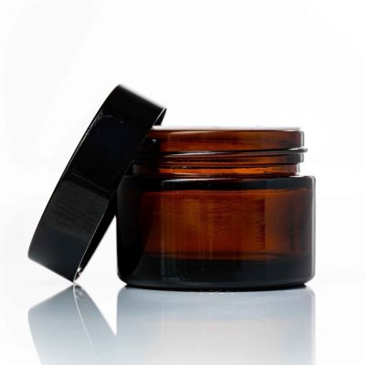 amber glass jar with black lid